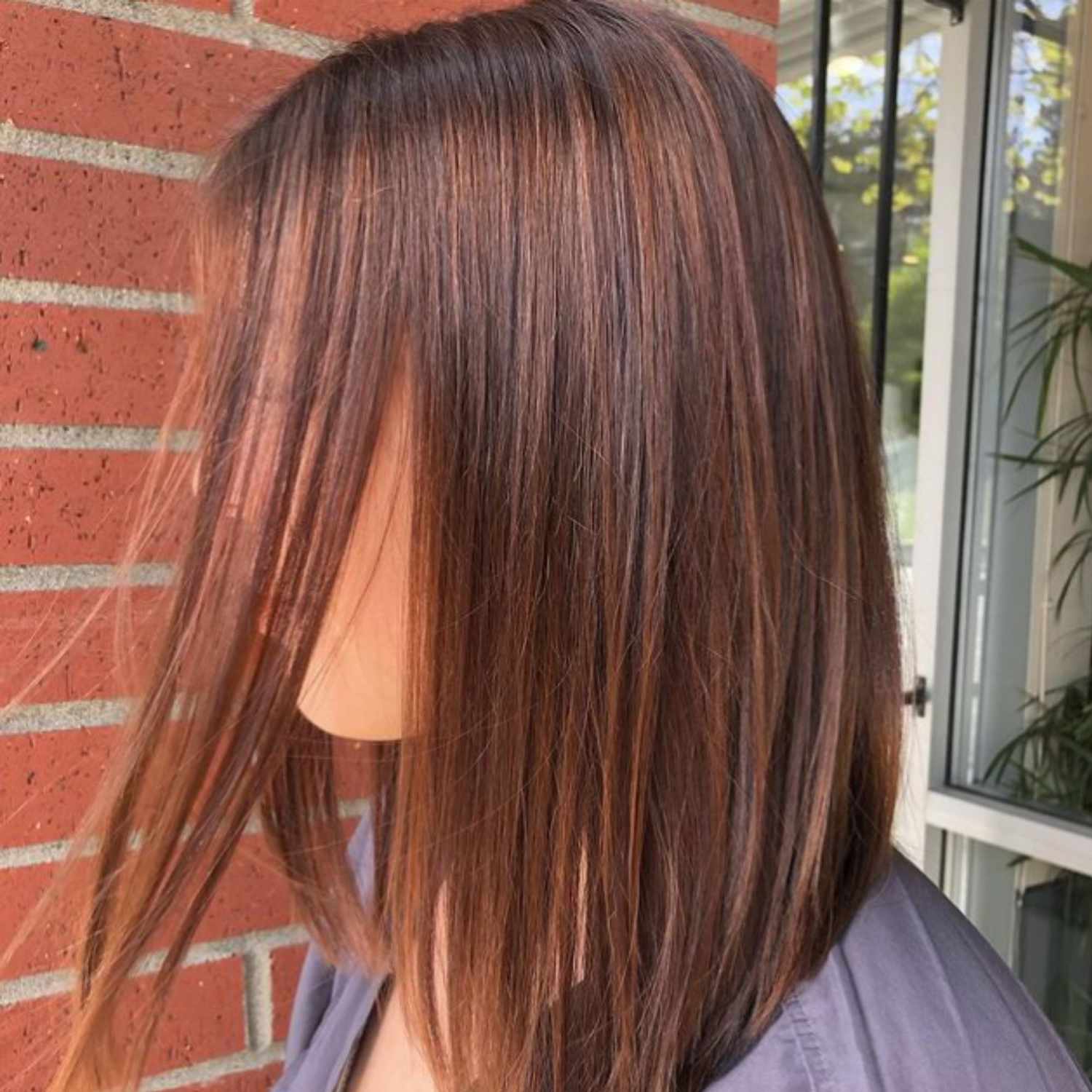 Subtle dimensional brunette balayage highlights.