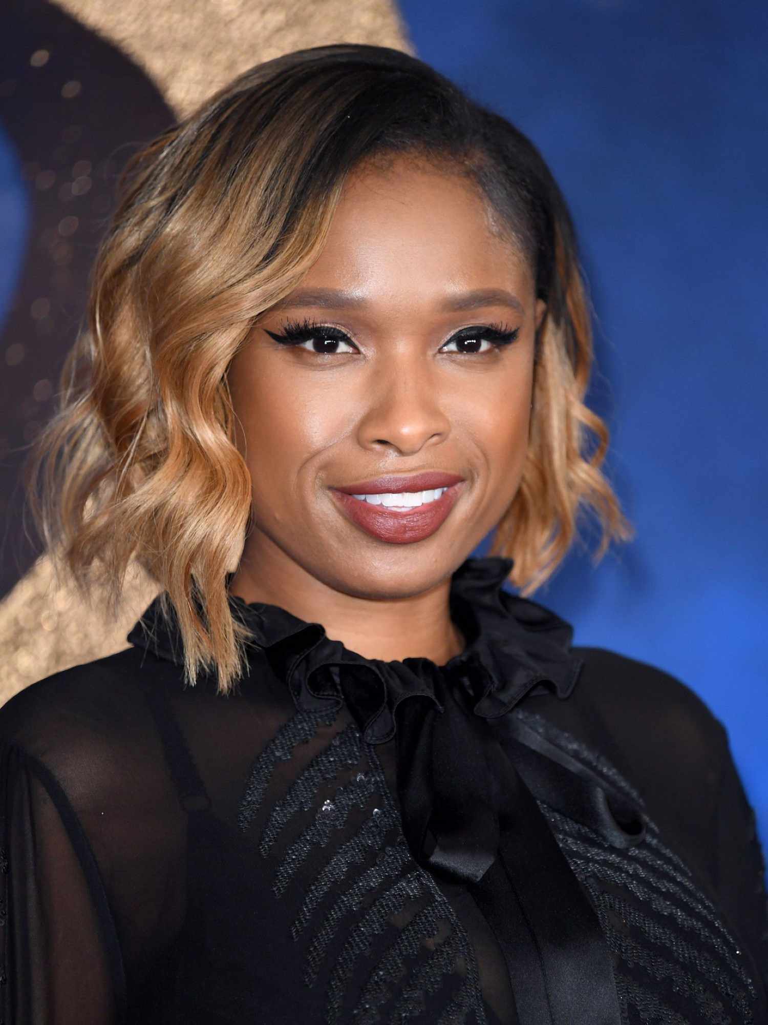 Close up of Jennifer Hudson with a honey blonde bob