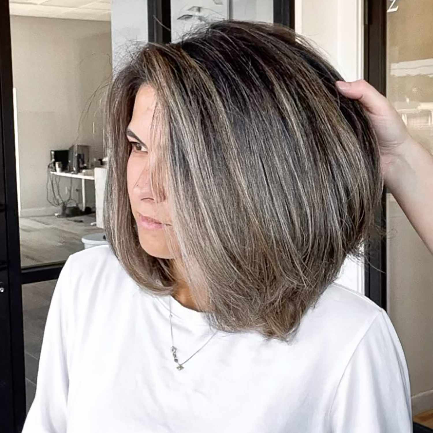 A fluffy, ashy bob with balayage 