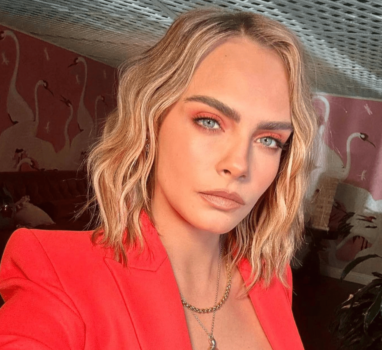 Cara Delevingne wearing flat iron waves on her long bob