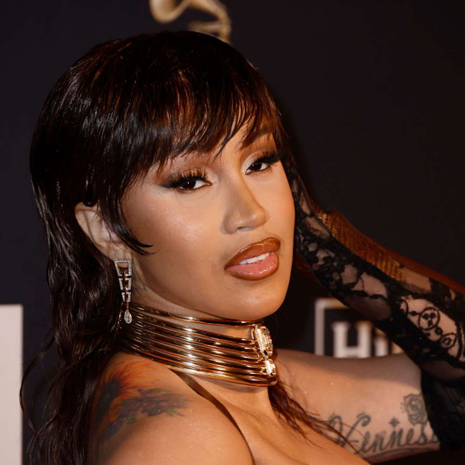 Cardi B with wispy micro bangs