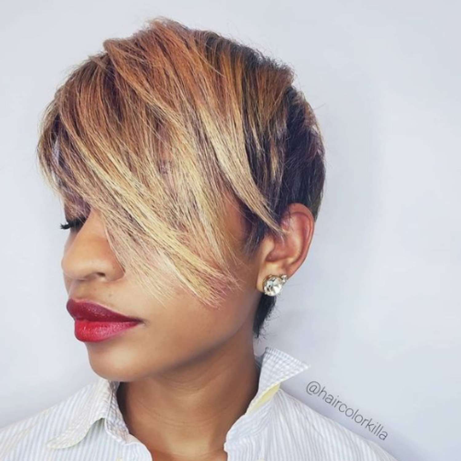 Caramel highlights on a pixie cut.