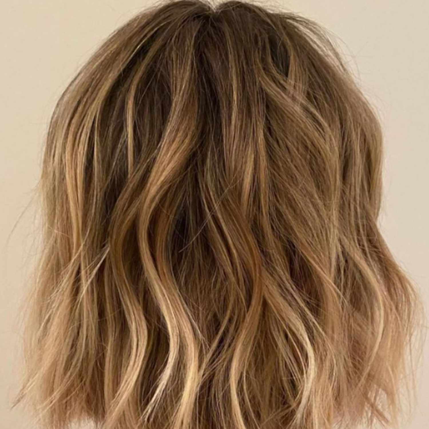 Short, piece-y bronde hair viewed from behind