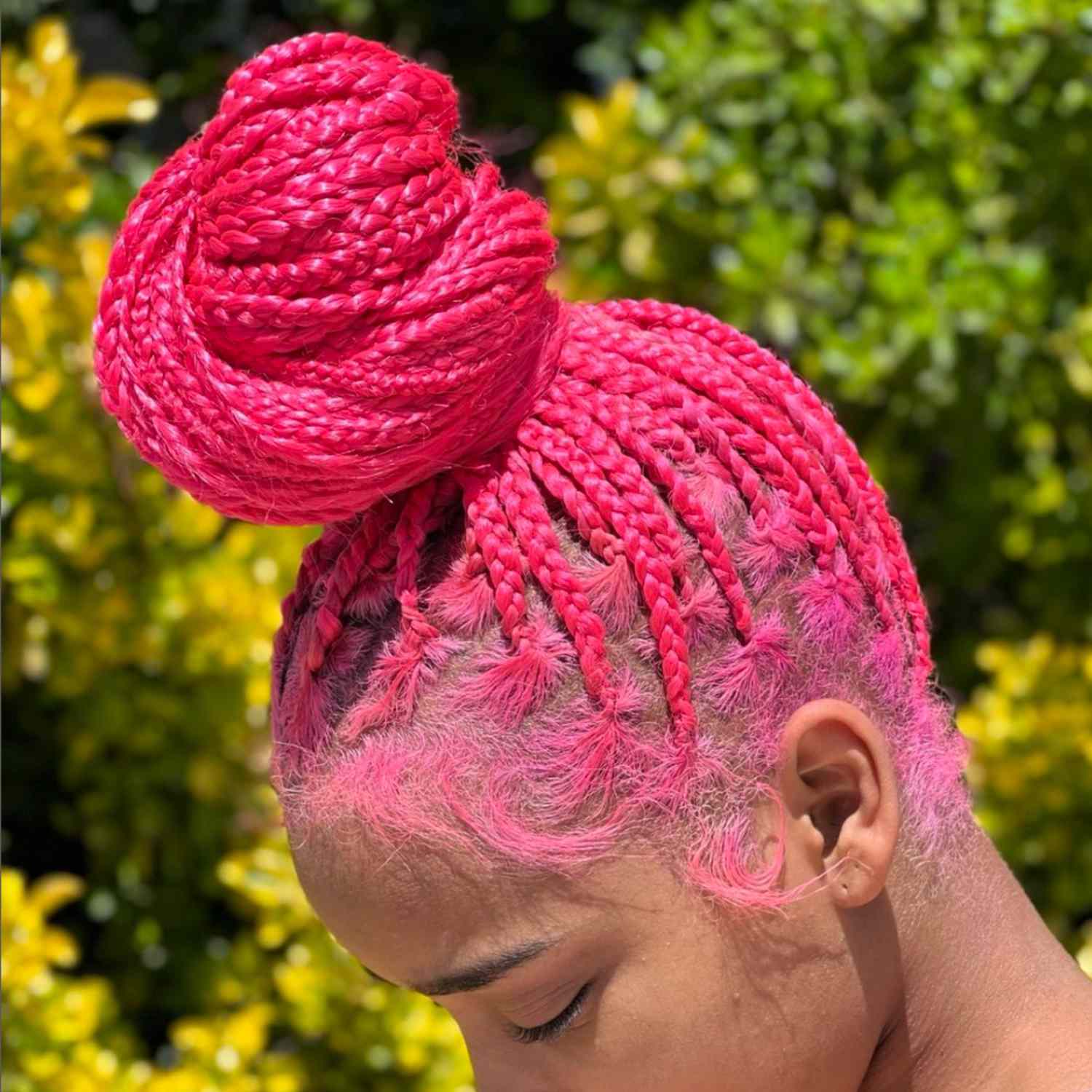 Hot pink braided bun.