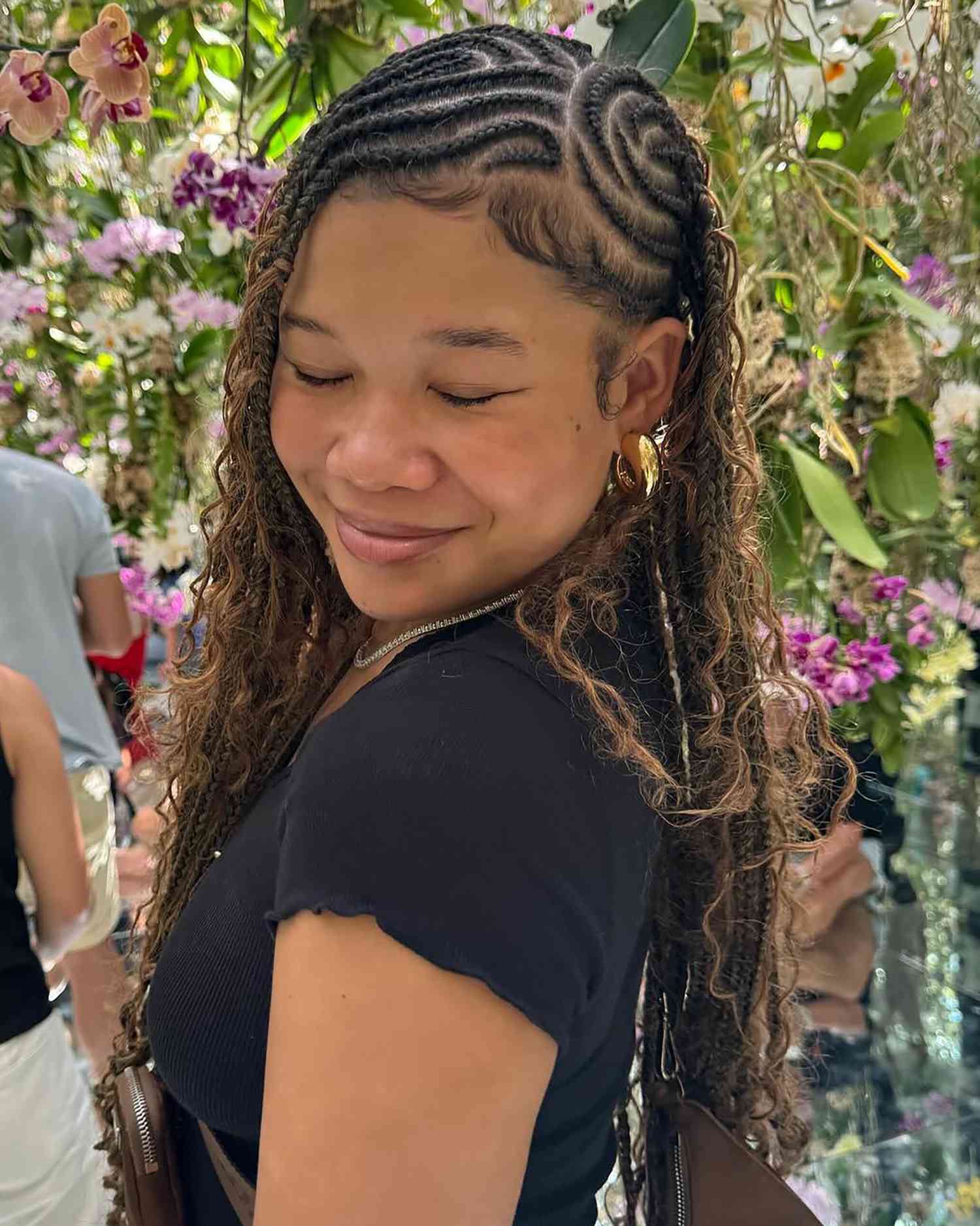 actor Storm Reid with intricately designed braids