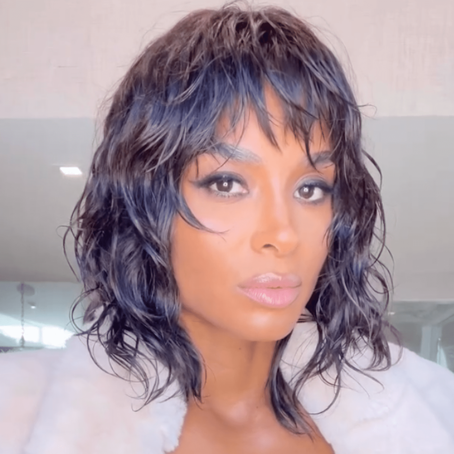 Ciara wearing wet wavy french bangs