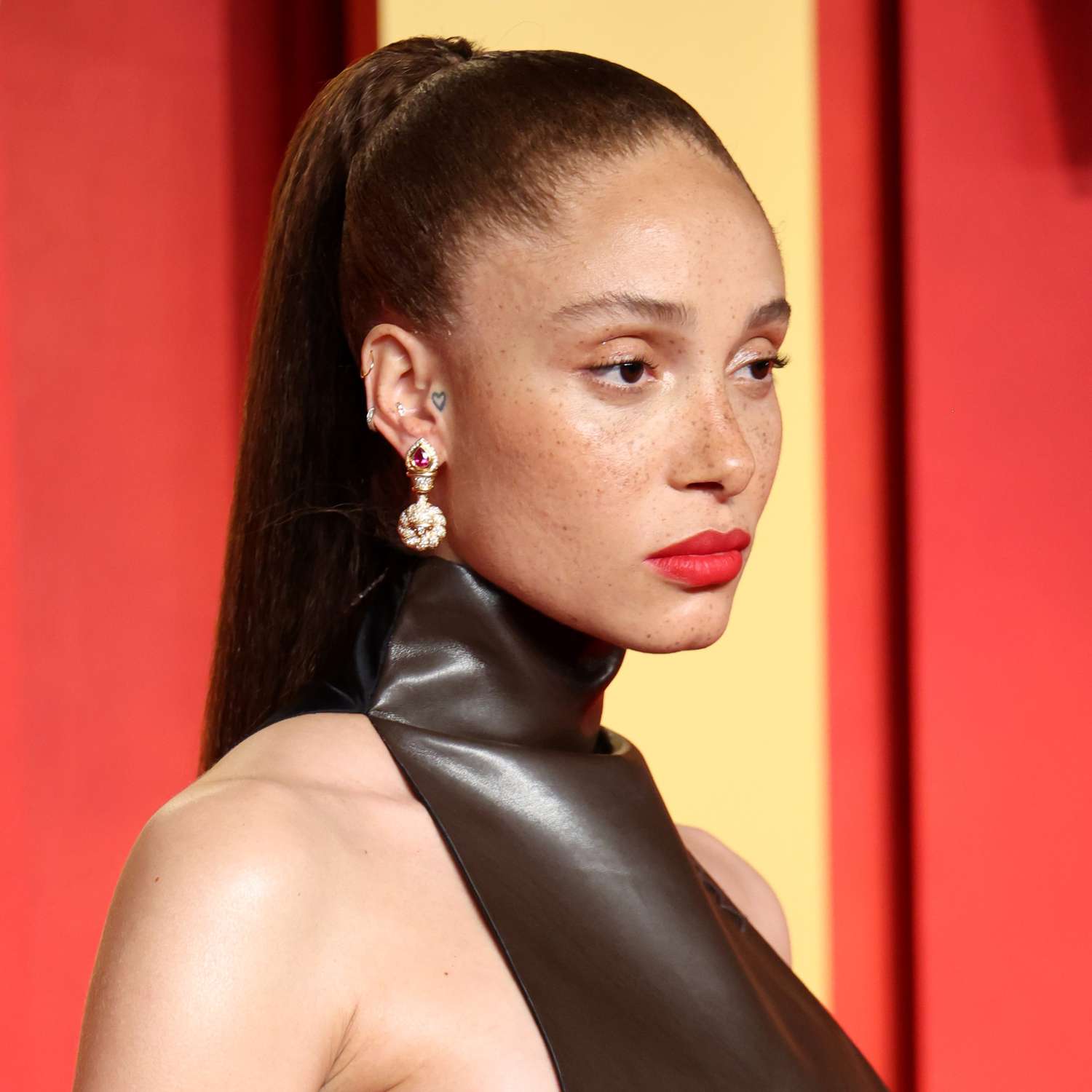 Adwoa Aboah attends the Vanity Fair party in a thick, chic high ponytail